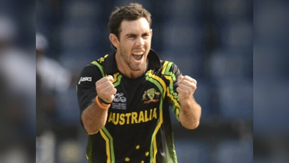 Ice-cool scoop: Maxwell takes one-handed catch holding ice cream