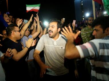 Jubilant Iranians in Tehran on Tuesday. AP