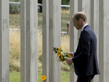 Britain's Prince William walks to lay flowers during a service for survivors and relatives of the victims to mark the 10 year anniversary of the 7/7 London attacks. AFP
