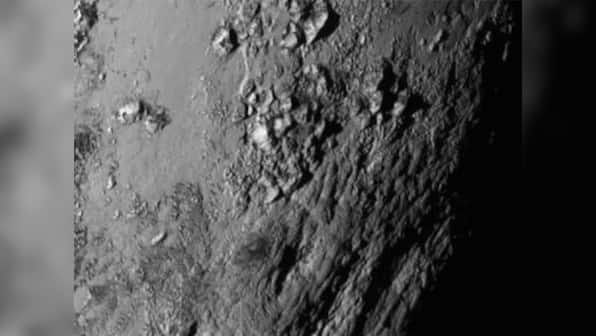 What NASA's New Horizons found: Ice mountains on Pluto, canyons on its moon