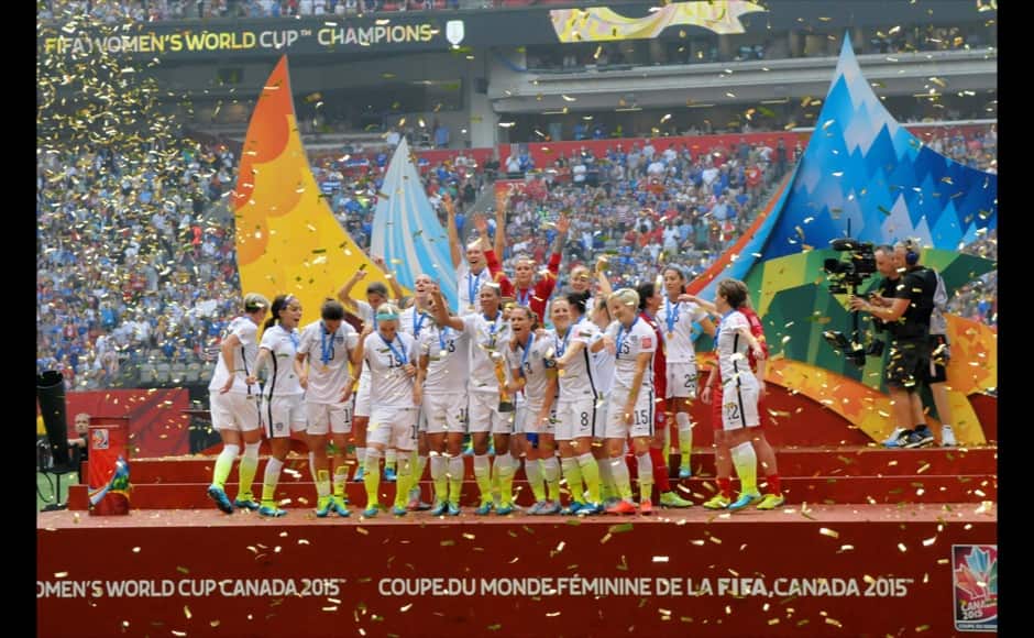 Jul 5, 2015; Vancouver, British Columbia, CAN; Players from the United States react after receiving the FIFA Women's World Cup trophy in the final of the FIFA 2015 Women's World Cup at BC Place Stadium. The United States defeated Japan 5-2. Mandatory Credit: Anne-Marie Sorvin-USA TODAY Sports - RTX1J5AR