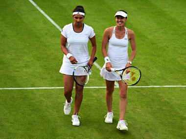 Sania-Hingis sail into second round at Wimbledon Sania-Hingis sail into second round at Wimbledon