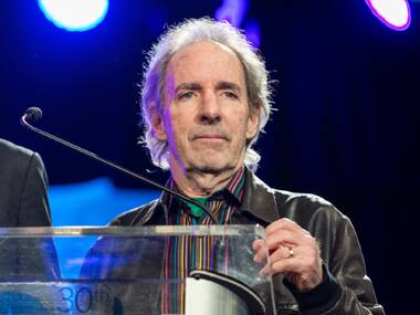 Harry Shearer and his many voices are returning to “The Simpsons” after a contentious and public contract dispute. AP