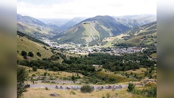 Paris police open fire on car at Tour de France barricades 