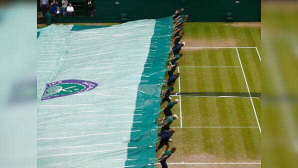 Roger Federer blames rain stoppage for Wimbledon woe
