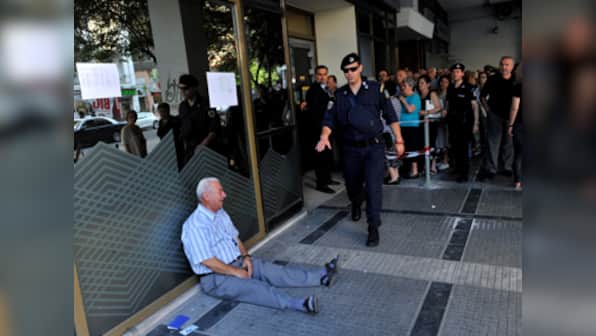 Australian businessman promises to pay pension of man who became 'the face of Greek crisis'