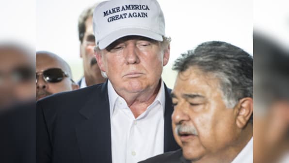 'I love Latinos', says Trump at US-Mexico border