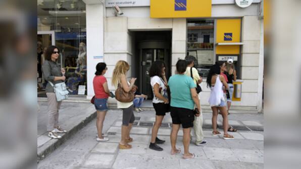 Greek banks set to reopen today, cash withdrawal restrictions remain