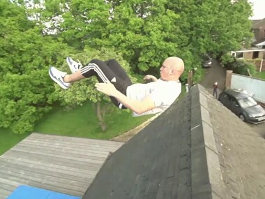 Swing on through to the other side: Man makes crazy jump over house ...