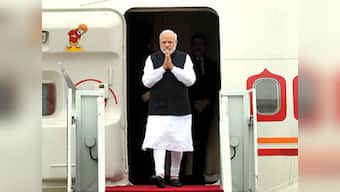 Who travelled abroad more? UPA ministers or Modi's ministers?