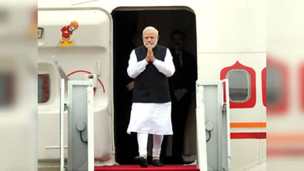 Who travelled abroad more? UPA ministers or Modi's ministers?