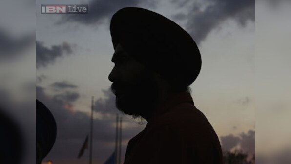 Discriminated due to his turban, Sikh postman wins battle against Disney