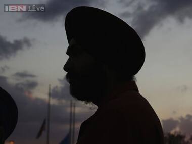 Discriminated due to his turban, Sikh postman wins battle against Disney