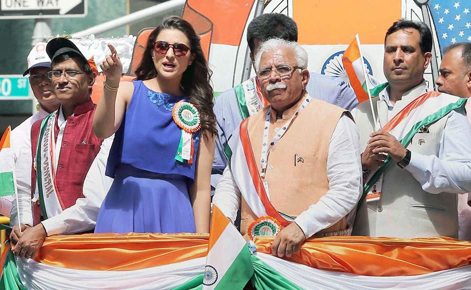 New York: Haryana Chief Minister Manohar Lal Khattar and Finance Minister, Captain Abhimanyu with actress Parineeti Chopra during 35th India day parade in New York City on Sunday. PTI