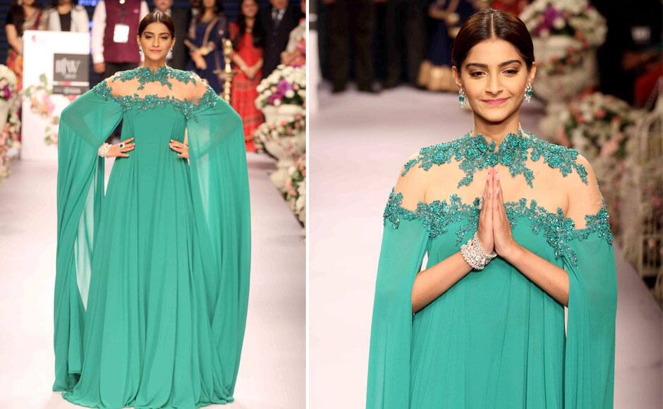Bollywood actor Sonam Kapoor displays creation of fashion designer Shaina NC during India International Jewellery Week, in Mumbai, India on August 3, 2015. Solaris Images