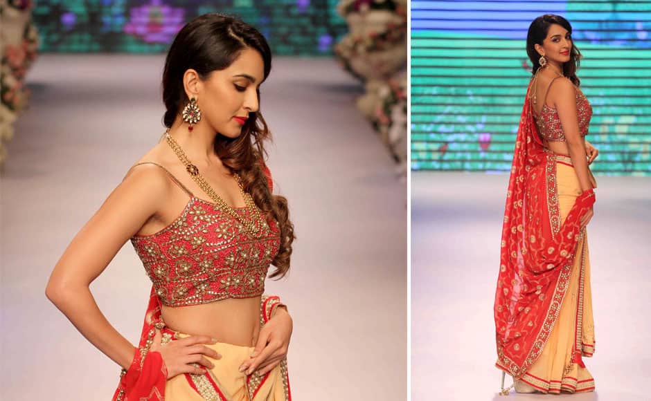 Bollywood actor Kiara Advani displays creation of fashion designer Shaina NC during India International Jewellery Week, in Mumbai, India on August 3, 2015. Solaris Images