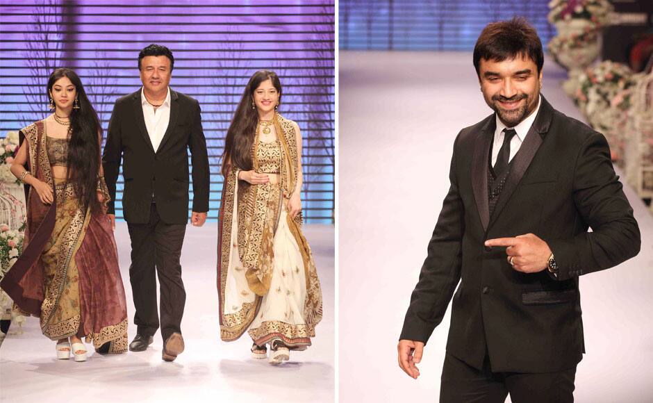 Bollywood music composer Anu Malik and actor Ajaz Khan displays creation of fashion designer Shaina NC during India International Jewellery Week, in Mumbai, India on August 3, 2015. Solaris Images