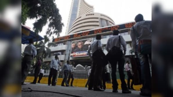 Sensex down 102 points in cautious trade, slips below 35,000 mark; power, banking, realty stocks decline; Re dips