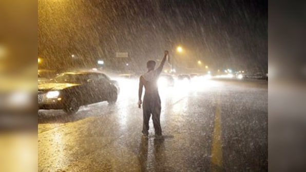 On anniversary of Ferguson shooting, demonstrator injured during clashes