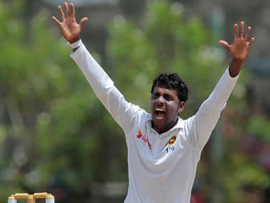  Tharindu Kaushal successfully appeals to dismiss India's Virat Kohli during the second day of the first Test. AP