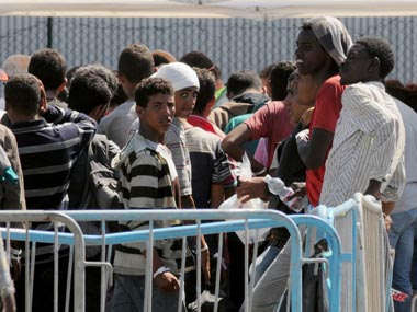 Fifty-two migrants found dead off Libya coast, Italian coast guards rescue 1,400 Fifty-two migrants found dead off Libya coast, Italian coast guards rescue 1,400