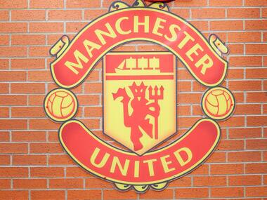 Man City fan gets Man United tattoo to raise money for son's rare condition treatment