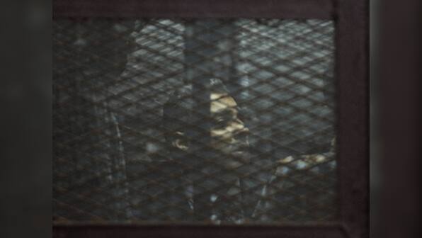 Egypt court sentences three Al-Jazeera reporters to three years in prison