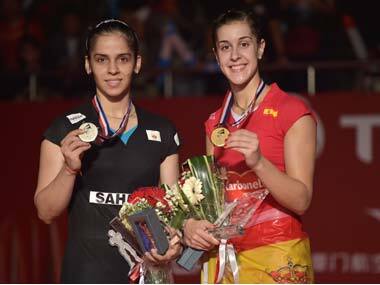 Saina Nehwal and Carolina Marin. AFP
