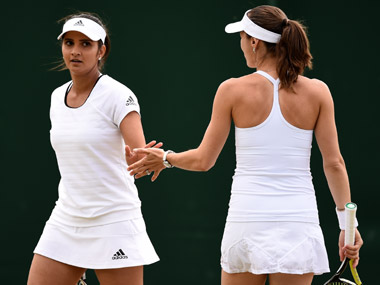 Sania-Martina lose Canadian Open semis to Garcia-Srebotnik in straight sets Sania-Martina lose Canadian Open semis to Garcia-Srebotnik in straight sets