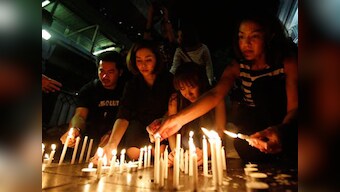 Bangkok shrine targeted by blast reopens to public, authorities continue hunt for suspect