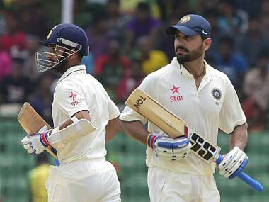 File photo of Ajinkya Rahane and Murali Vijay. Getty Images.