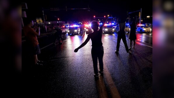 State of emergency in Ferguson after police gunfire wounds 18-year-old on Brown shooting anniversary 