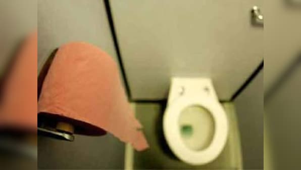 Chinese cop rescues newborn stuck face down in public toilet, parents untraceable 