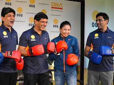 Sarita Devi with directors of Olympic Gold Quest (OGQ) Prakash Padukone Vishwanathan Anand and Geeth Sethi. AFP