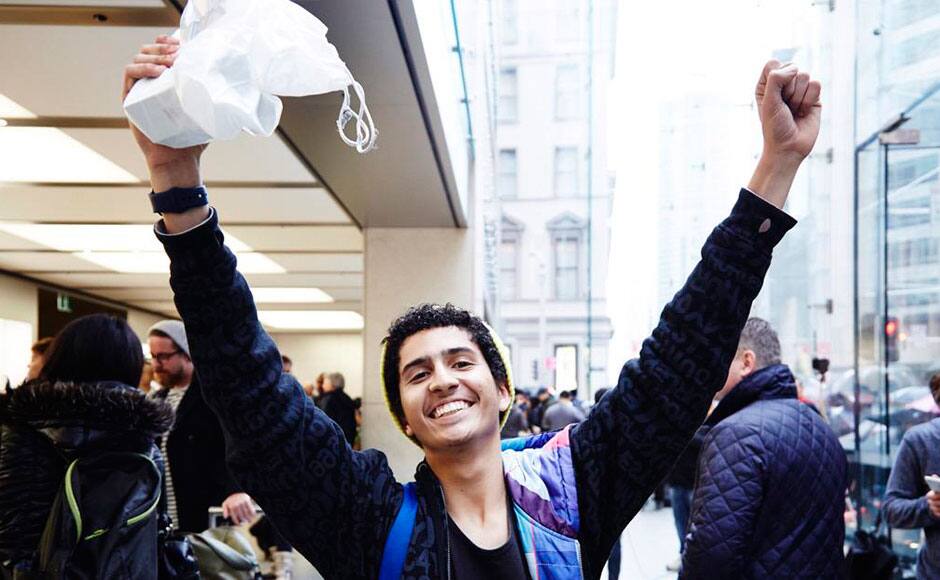 In Sydney one of the very first customers in the world to buy an iPhone 6s. Source: Tim Cook's Twitter account 