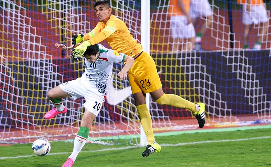 Within four minutes of the second goal, Mehdi Taromi made it game it 3-0. It was another defensive lapse as Azmoun surged forward to sneak in a pass between two Indian defenders, the others failed to intercept and the ball and it fell to Taremi who took his own time to shoot from outside of the boot to beat the diving Gurpreet. (In pic): Iranian player Sardar Azmoun (L) vies for the ball with Indian Goalkeeper Gurpreet Singh Sandhu. AFP