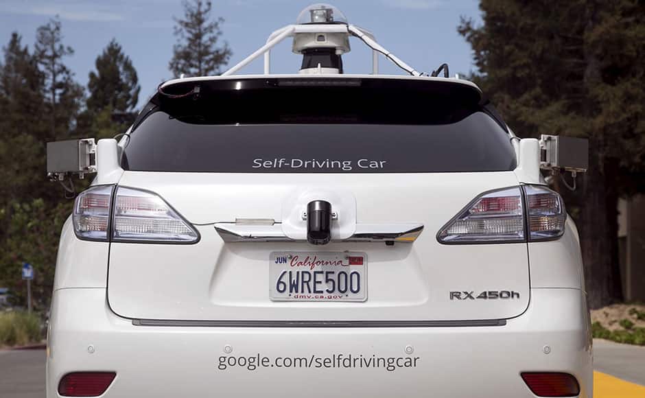 The rear of a Lexus SUV equipped with Google self-driving sensors is seen during a media preview of Google's prototype autonomous vehicles in Mountain View, California September 29, 2015. REUTERS