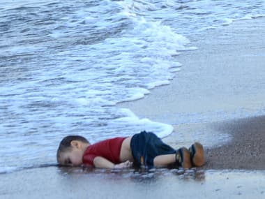 The lifeless body of three-year-old migrant, identified by Turkish media as Aylan Kurdi, was found on a sea shore in Bodrum, Turkey on early Wednesday. AFP