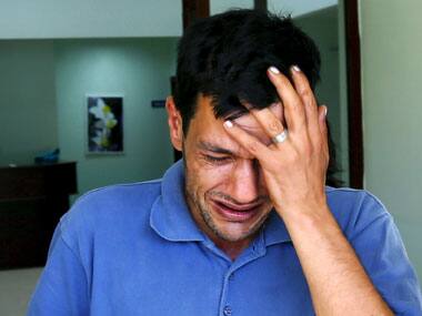 Abdullah Kurdi, father of three-year old Aylan Kurdi, cries as he leaves a morgue in Turkey. Reuters