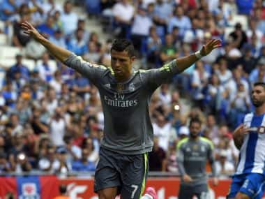 Cristiano Ronaldo celebrates one of his five goals against Espanyol en route to breaking Real Madrid's club record. AFP