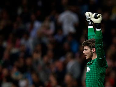 Manchester United's goalkeeper David de Gea celebrates his team's goal against Real Madrid during the Champions League soccer match at Santiago Bernabeu stadium in Madrid February 13, 2013. REUTERS/Susana Vera (SPAIN - Tags: SPORT SOCCER) - RTR3DR21