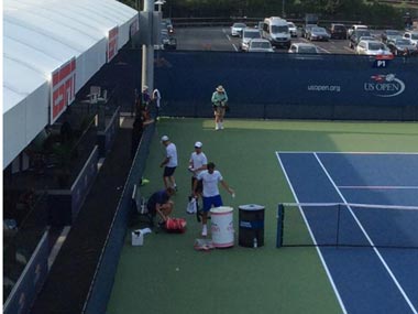 Swachh Tennis Abhiyaan: Roger Federer seen cleaning practice courts at US Open Swachh Tennis Abhiyaan: Roger Federer seen cleaning practice courts at US Open