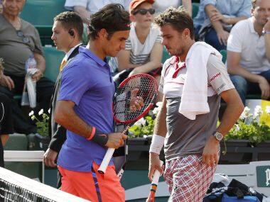 Photo of Stan Wawrinka and Roger Federer from French Open 2015. AFP