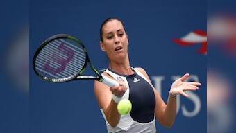 US Open: Italy's Flavia Pennetta beats second-seeded Halep to reach finals