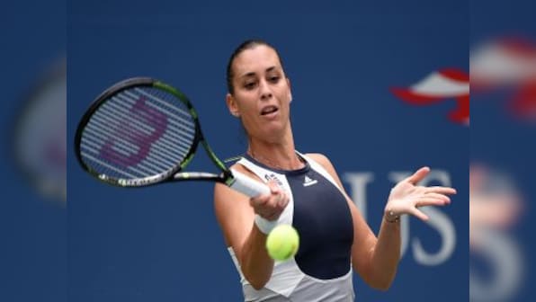 US Open: Italy's Flavia Pennetta beats second-seeded Halep to reach finals