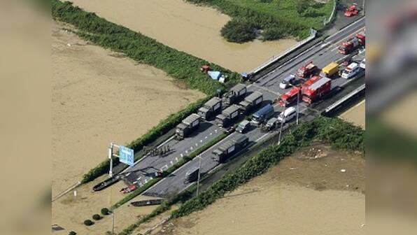 Thousands of rescuers deployed as Japan floods kill three and leave 25 people missing