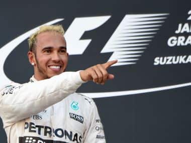Lewis Hamilton wins third world title. AFP