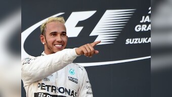 My greatest moment, says F1's 'Superman' Lewis Hamilton as he bags third world title