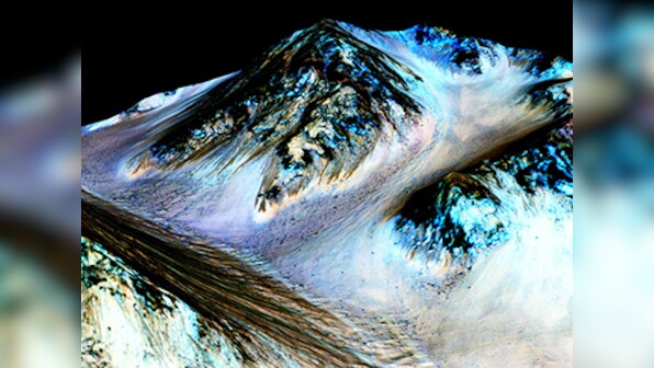Life on Mars? Nasa finds signs of flowing water on the red planet