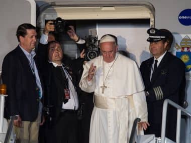Pope Francis waves before leaving Philadelphia on Sunday. AFP